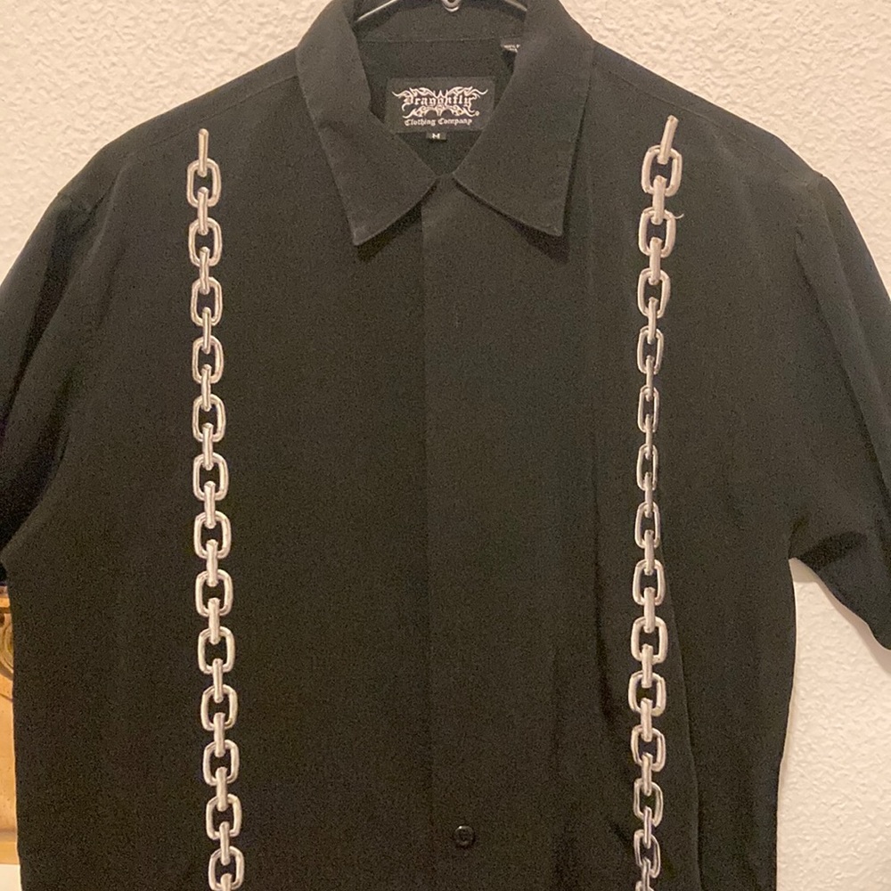 Dragonfly brand men’s medium black button up shirt. Gently used, can fit a Lrg